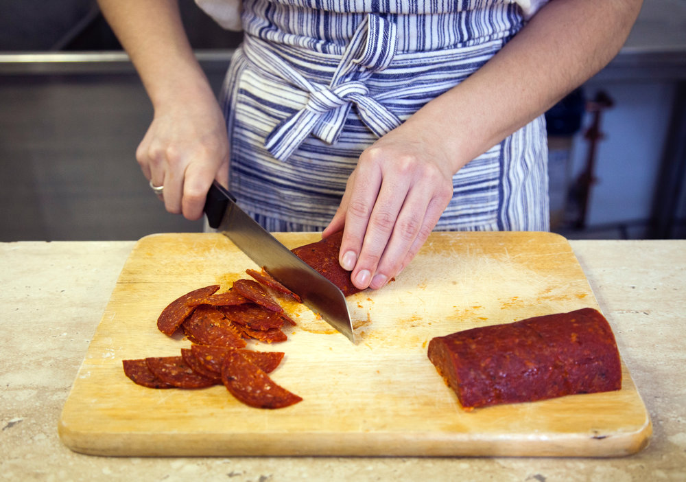 Rolling Pepperoni has its own custom pepperoni recipe, made by  Parma Sausage  in the Strip.